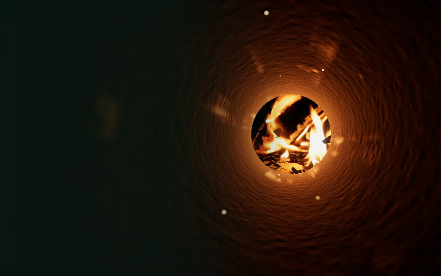 La descente dans le conduit noirci de suie, vers le feu de bois qui brûle tout en bas.